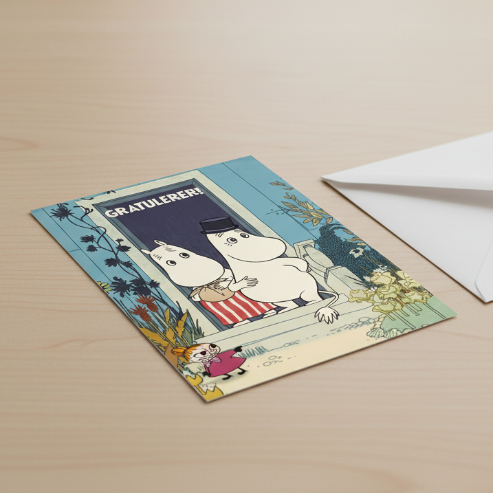 Moomin congratulations card on desk with envelope
