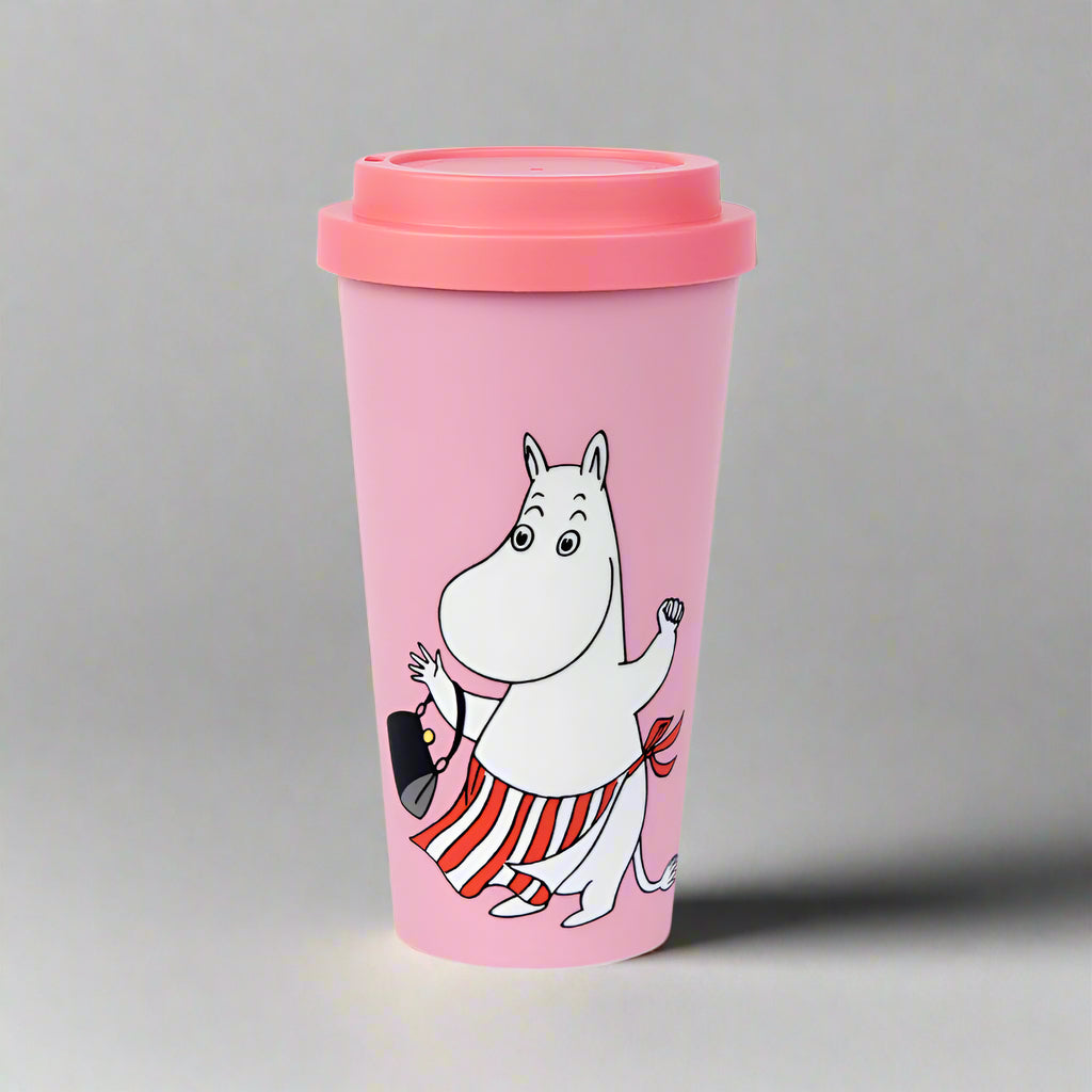 A pink take-away mug with a white character, Mummimamma, designed on the front, accompanied by a pink lid.